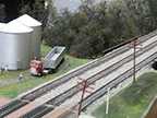 Grain Truck by the Main Line